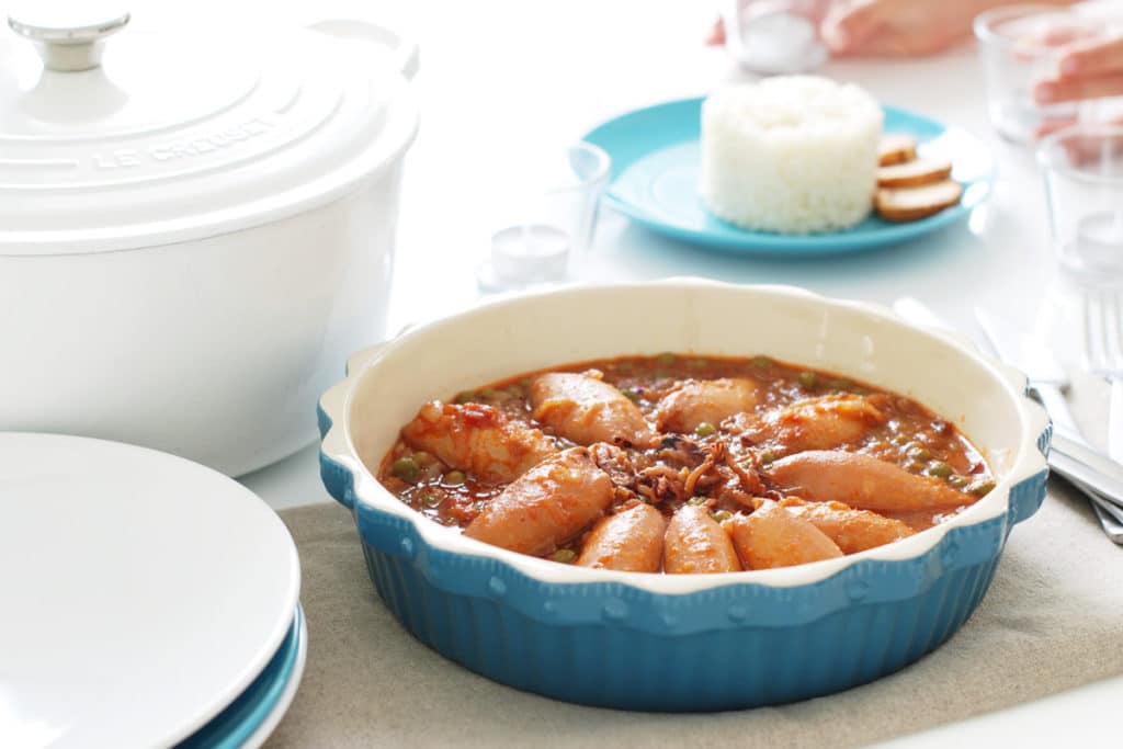 Chipirones en salsa con guisantes y acompañados de arroz de guarnición