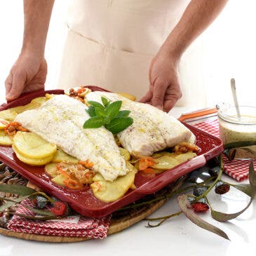 Merluza al horno con patatas confitadas